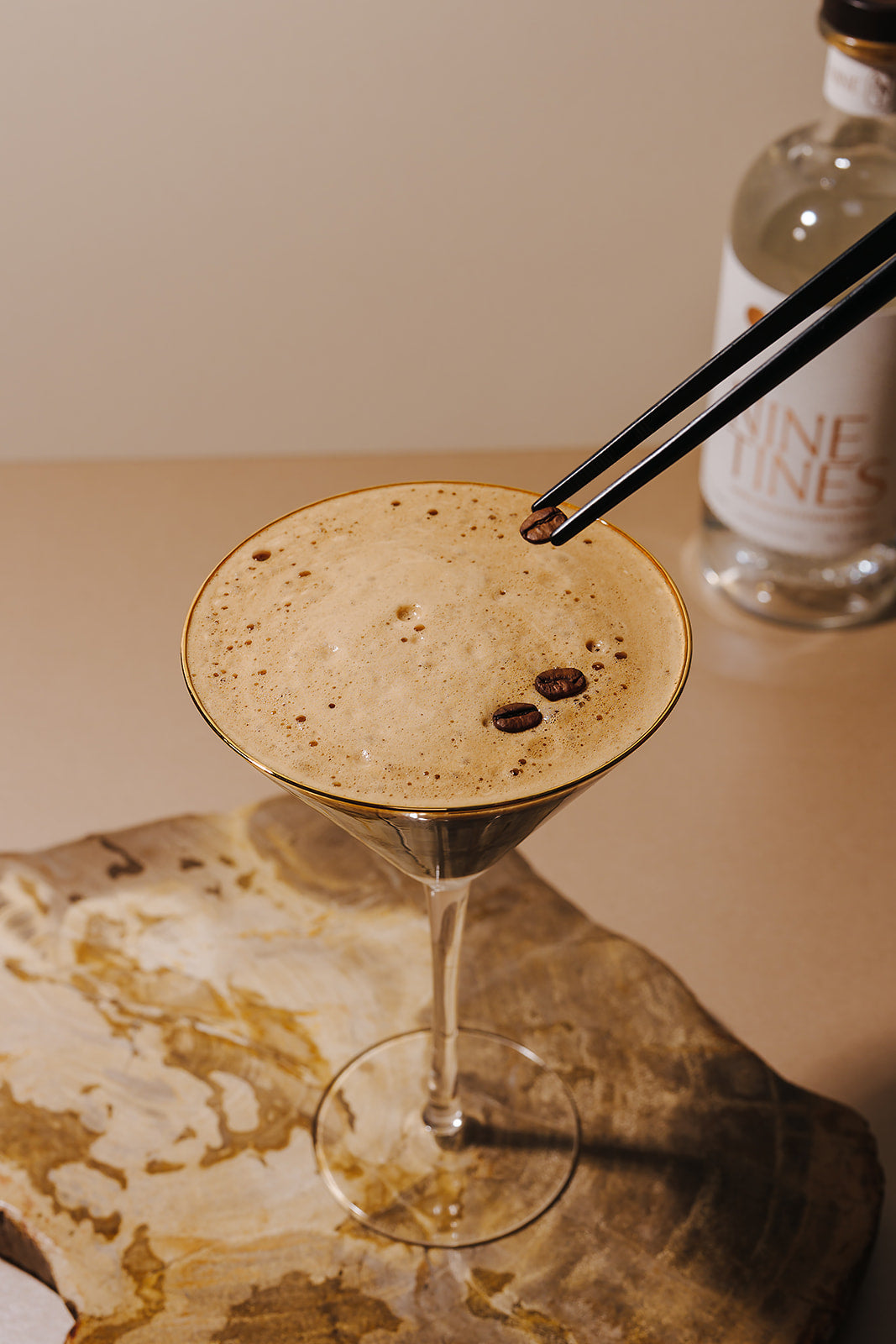 Close-up of Espresso Martini cocktail in martini glass with coffee bean garnish