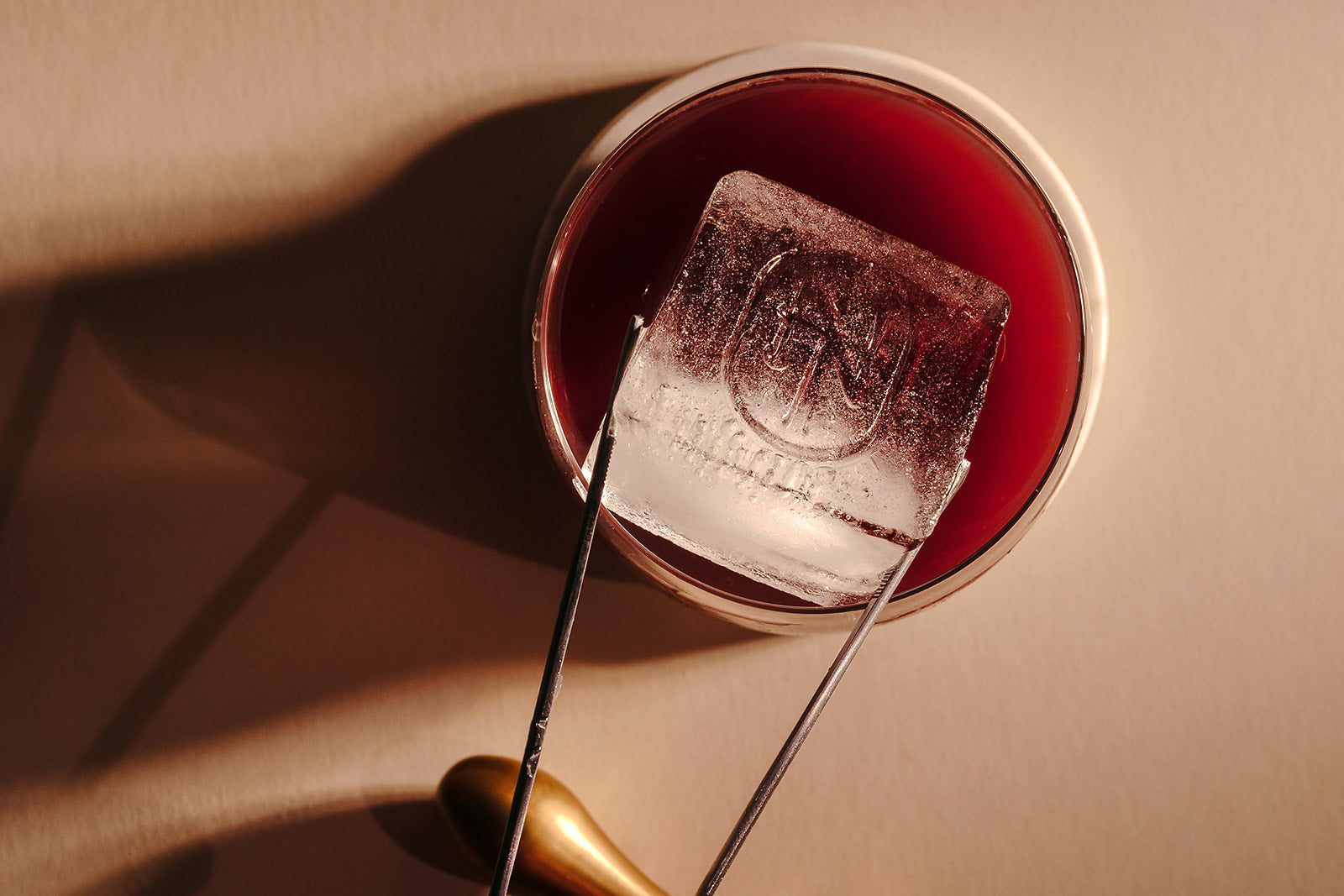 Rich cherry sour cocktail featuring Nine Tines Vodka served over ice