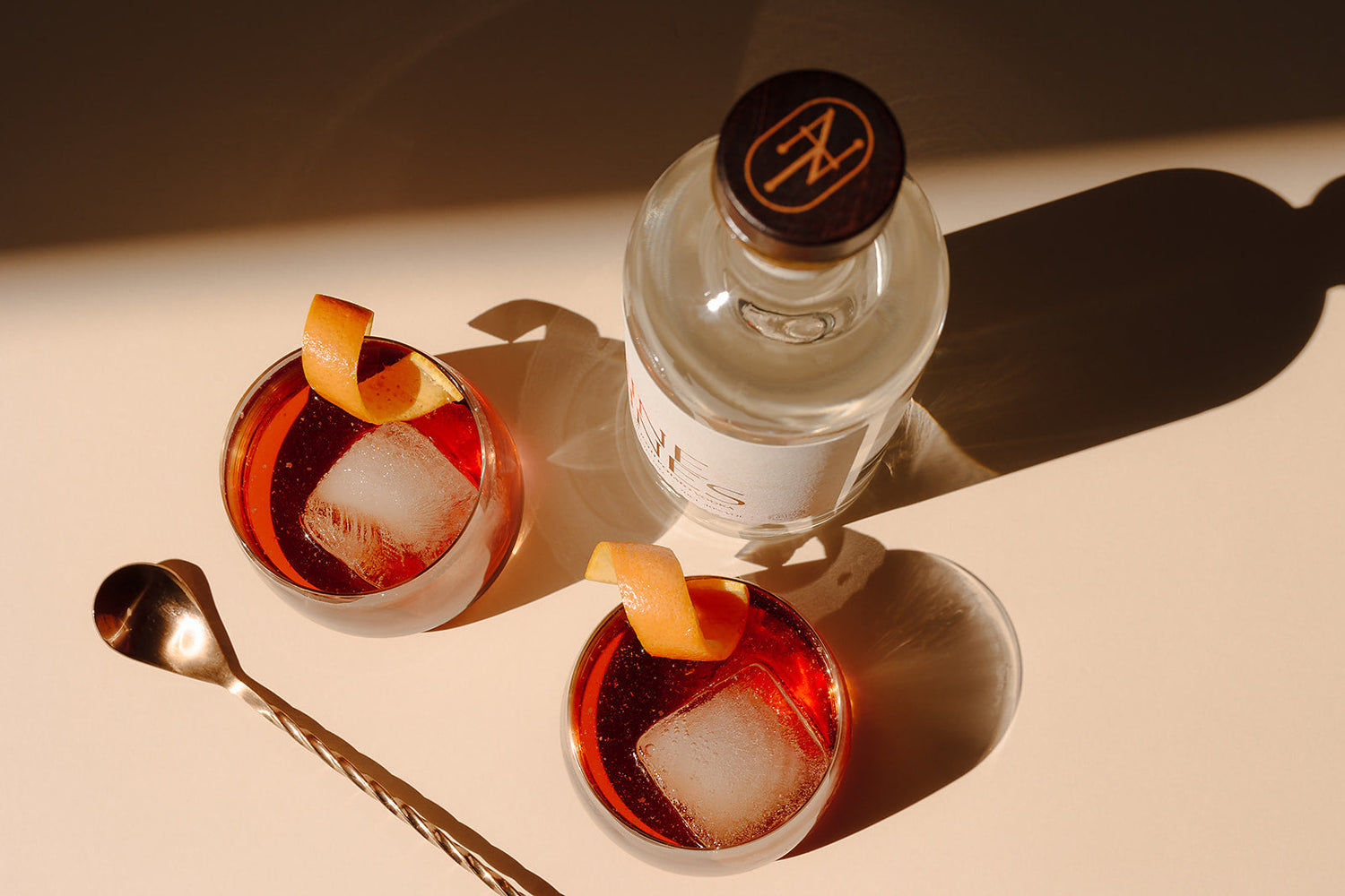 odka Negroni made with Nine Tines Potato Vodka in lowball glass with citrus twist