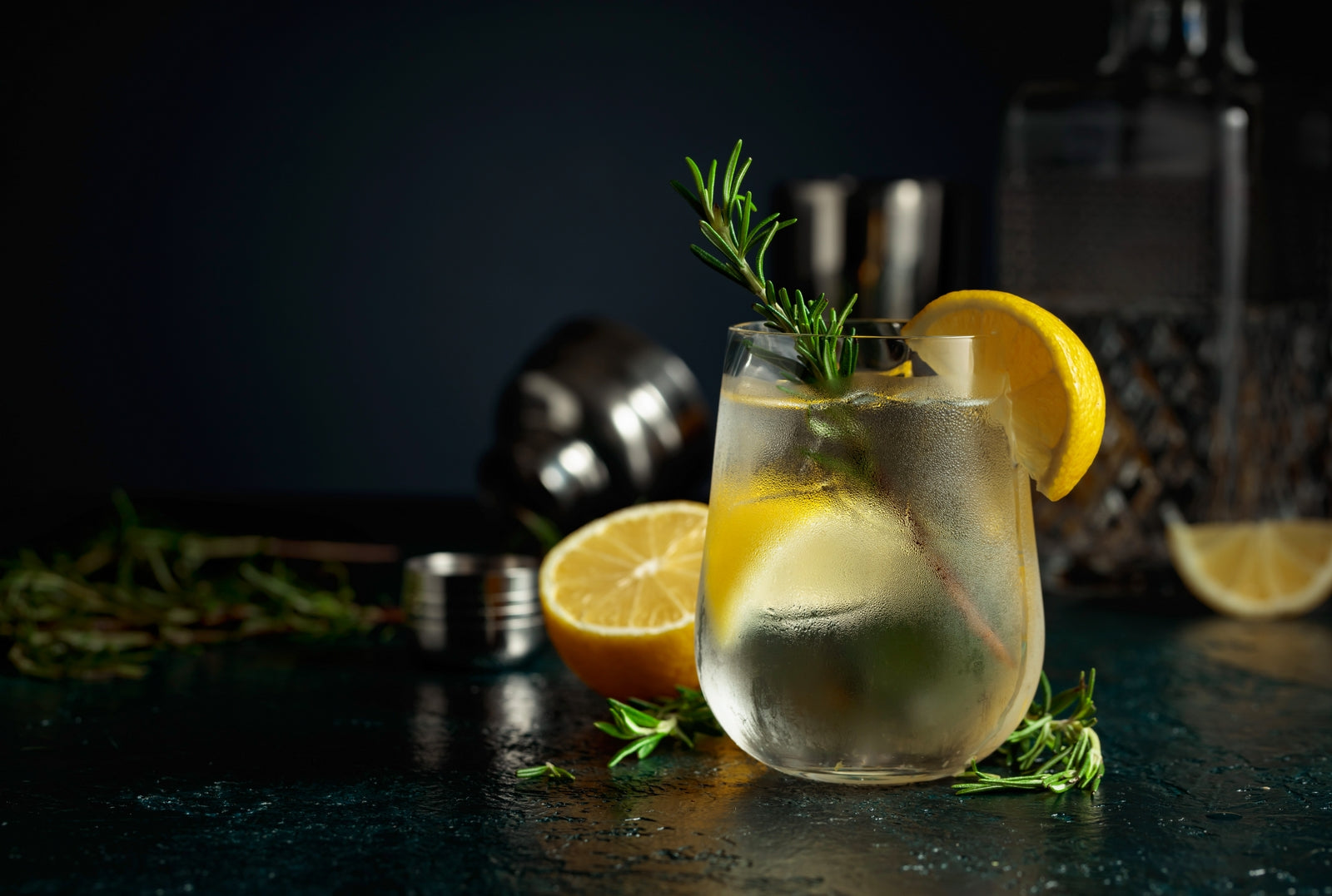 Tines & Tonic made with Nine Tines Potato Vodka, tonic water and lemon slices in tall glass
