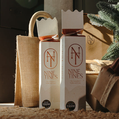 Nine Tines crackers under a Christmas Tree