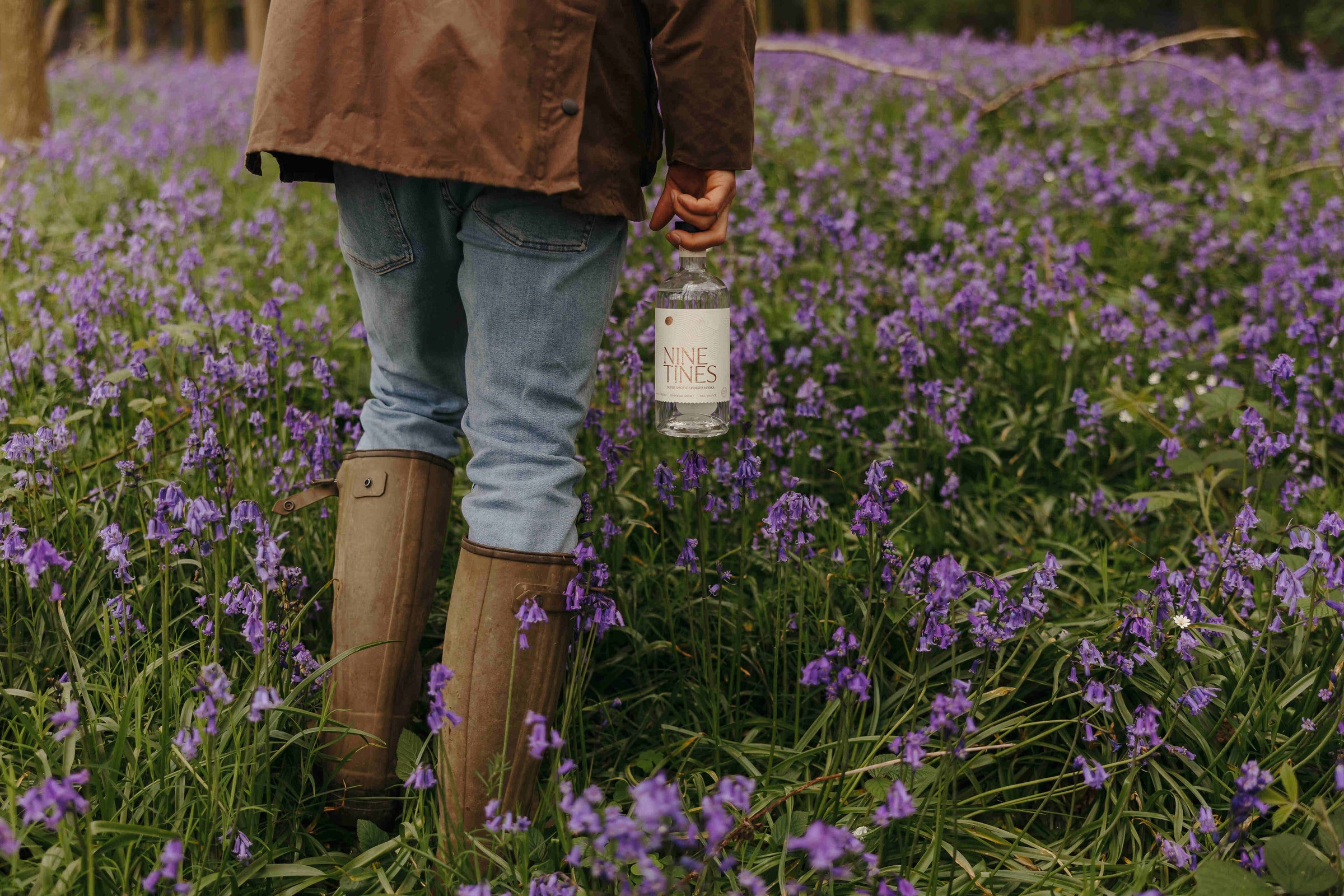 Potato vodka bottle with bluebells